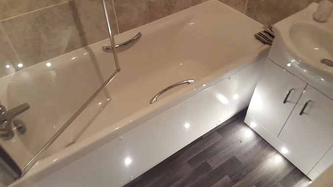 Bath, shower-screen, and sink with custom lighting
